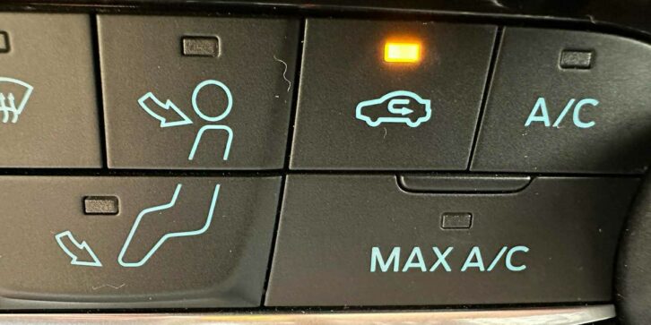 Bouton de recirculation d'air activé