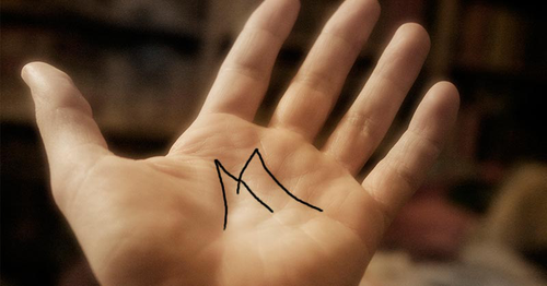 Illustration des lignes de la main formant un M