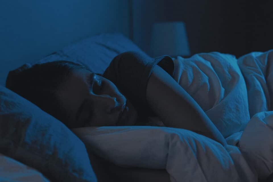 Personne dormant paisiblement dans son lit