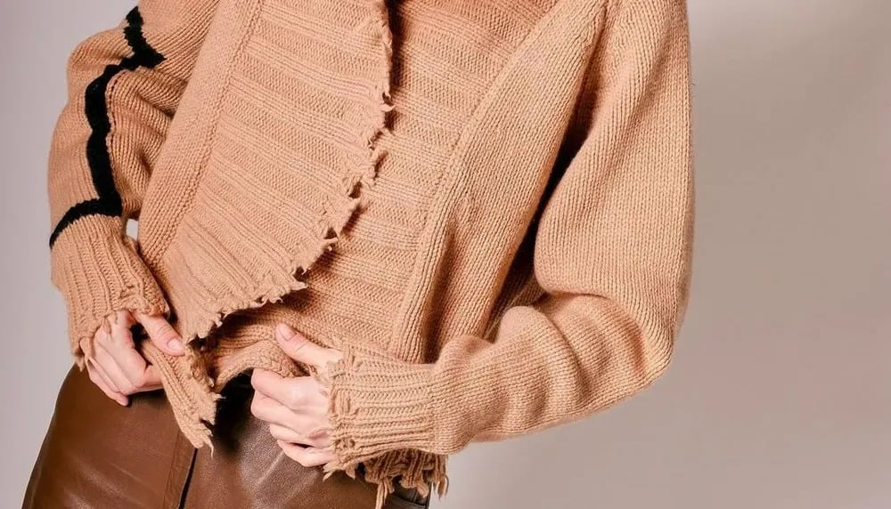 Pull de qualité et vêtement usé, comparaison