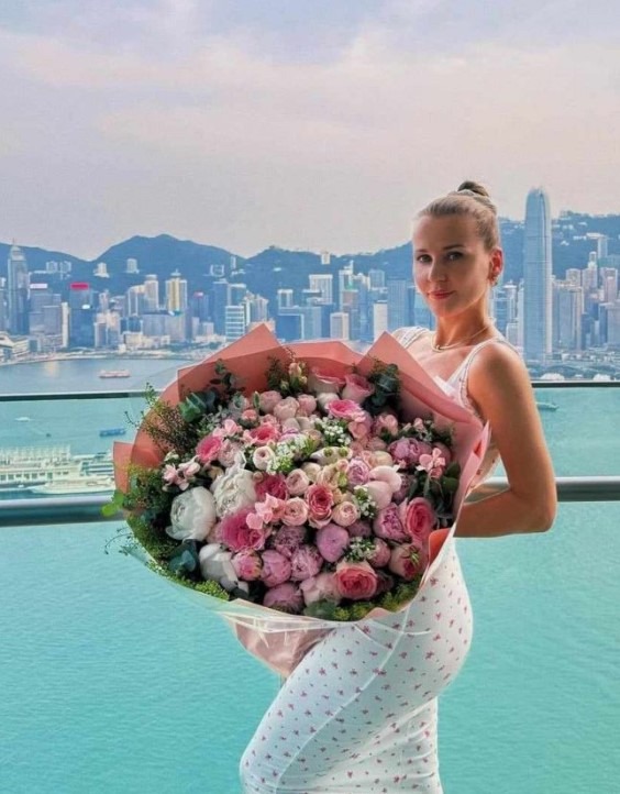 Jean-Claude Van Damme et Alena Kaverina lors d'un voyage